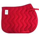 Red horse saddle pad with quilted design and adjustable straps